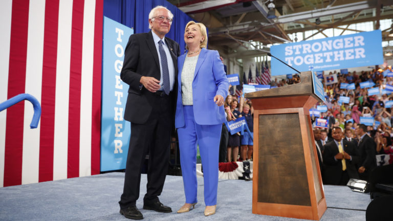 Hillary Clinton And Sen. Bernie Sanders (I Vt.) On Stage During A Campaign Event At Portsmouth High School In Portsmouth, N.H.
